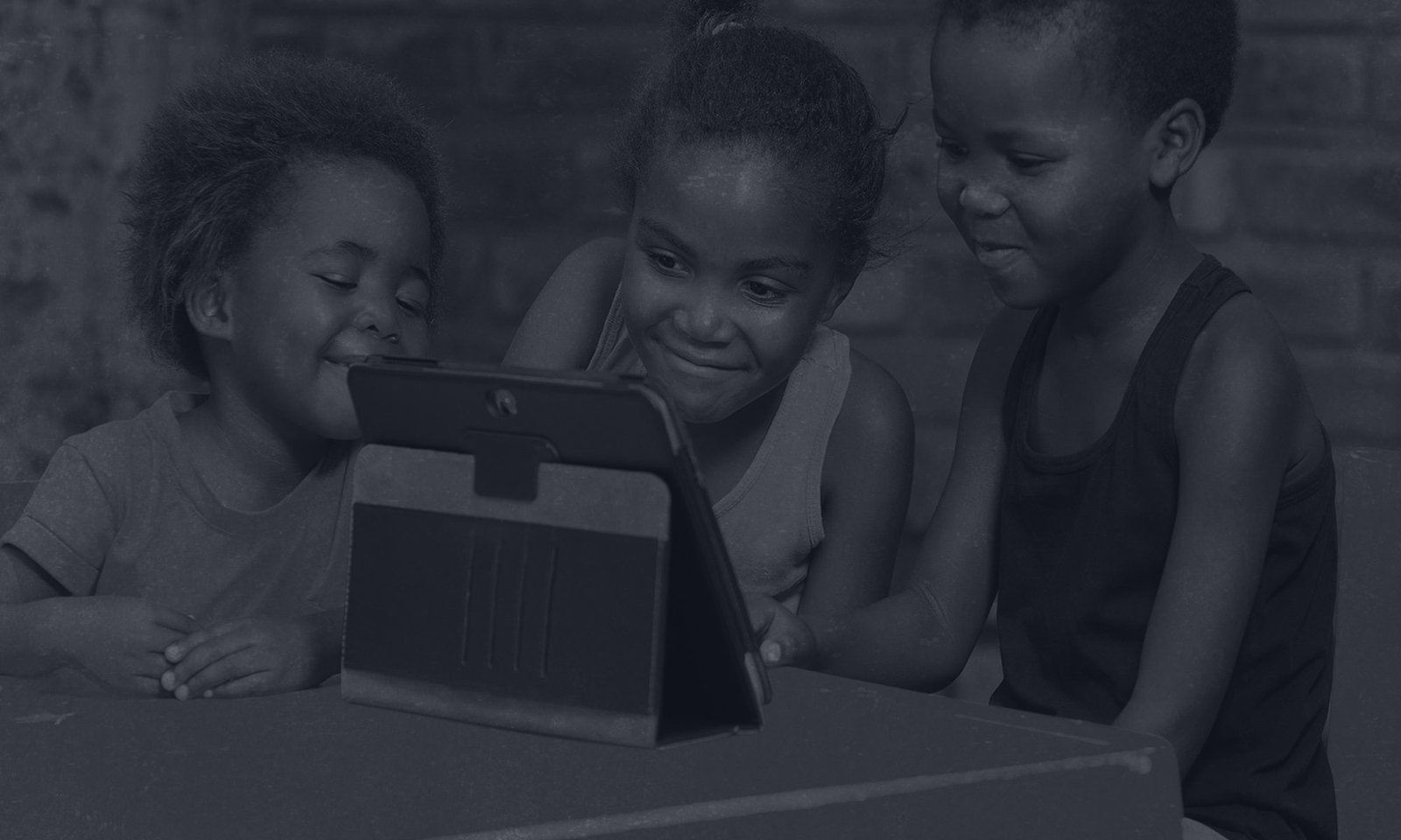 Kids Looking at Tablet Kids Looking at Tablet